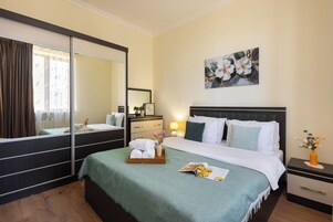 Economy appartement | Luxe beddengoed, een strijkplank/strijkijzer, babybedden, extra bedden