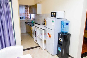 Business Apartment | Private kitchen | Fridge, microwave, cookware/dishes/utensils - Lux Suites Marcus Garden Apartments (Nairobi)