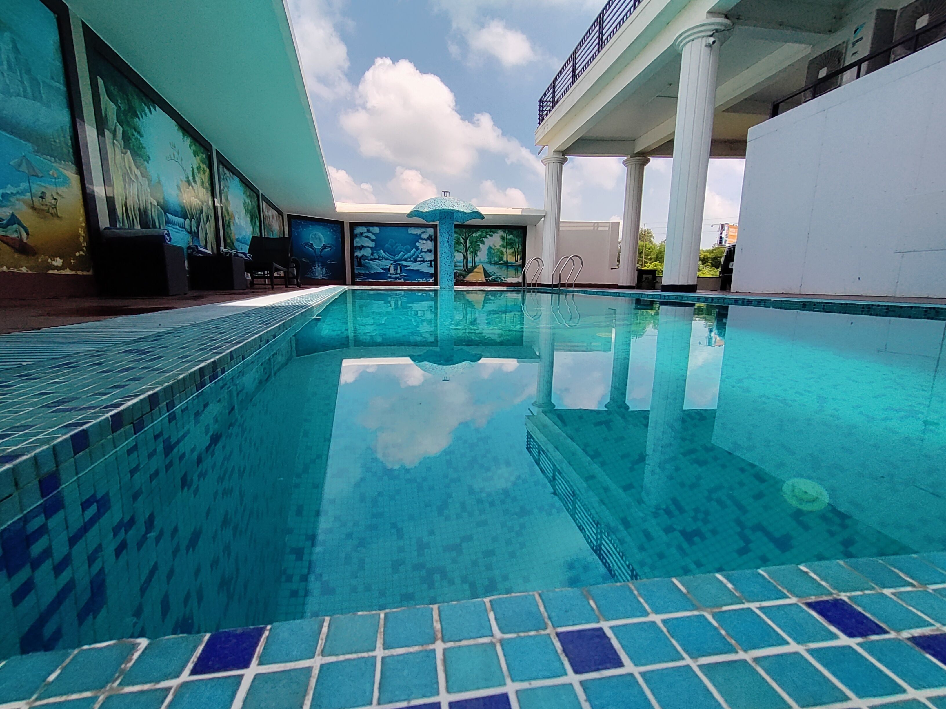 Outdoor pool, open 8:00 AM to 9:30 PM, pool umbrellas