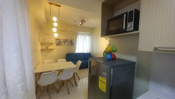 Deluxe Quadruple Room | 1 bedroom, desk, free WiFi, bed sheets