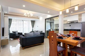 Elite Apartment | Living area | 24-inch Smart TV with digital channels