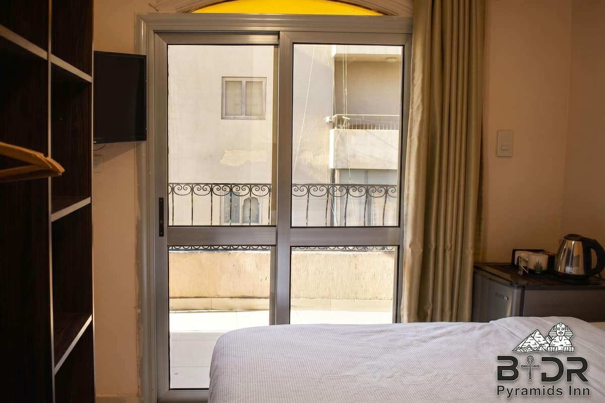 Chambre Deluxe, 1 lit double | Literie de qualité supérieure, minibar, rideaux occultants