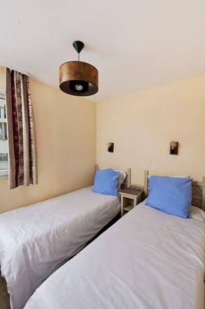 2 habitaciones, wifi gratis y ropa de cama 