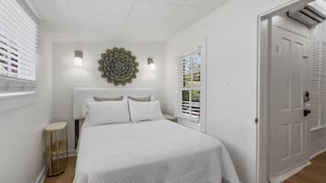 1 bedroom, desk, iron/ironing board, travel cot