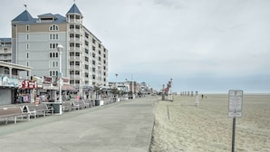 A beachfront hotel with balconies, a boardwalk, shops, and a sandy beach. - 2 Mi to Ocean City Boardwalk: Gem w/ Pool + Marina (Ocean City)