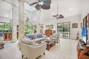 Villa | Living area | 50-inch flat-screen TV with cable channels