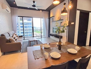 Standard Apartment, 2 Bedrooms, Non Smoking, Kitchen | Living area | 48-inch Smart TV with cable channels, video-game console, Netflix - Atlantis Residence (Malacca City)