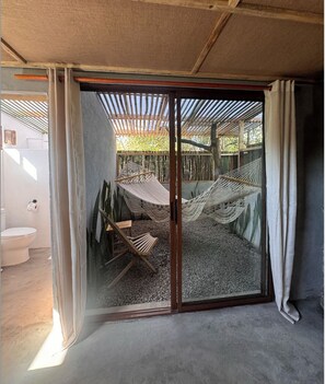 Deluxe Room, Garden View | Terrace/patio