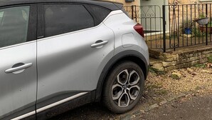 A silver SUV parked in front of a stone cottage with a sign reading "Jasmin Cottage." - Traditional Cotswold cottage with stunning views and walking (Stroud)