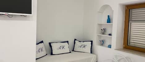 Family Room | 2 bedrooms, free minibar, individually decorated, individually furnished