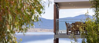 Moongate with beautifully styled, open plan living with panoramic views over Lake Jindabyne