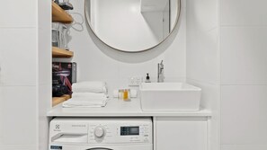 Shower, hair dryer, towels