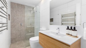 Shower, towels, soap, shampoo