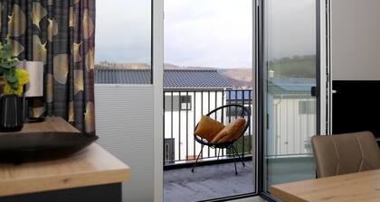 Sonnenweg 46/5 – Auszeit mit Seeblick. Sauna. Balkon.