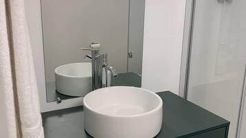Eco-friendly toiletries, hair dryer, towels, soap