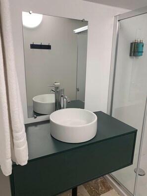 Eco-friendly toiletries, hair dryer, towels, soap
