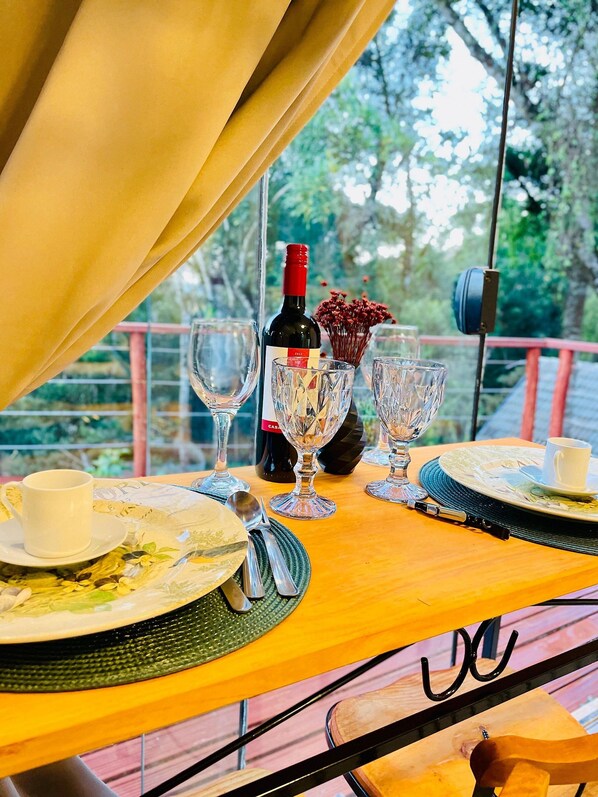 Suite Deluxe | Restaurante al aire libre