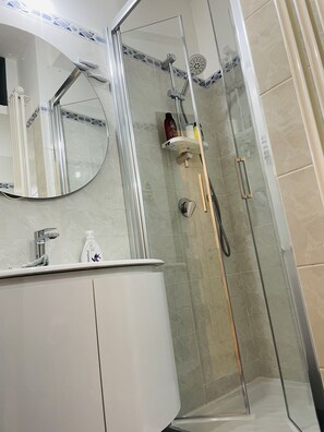 Hair dryer, towels, soap, shampoo