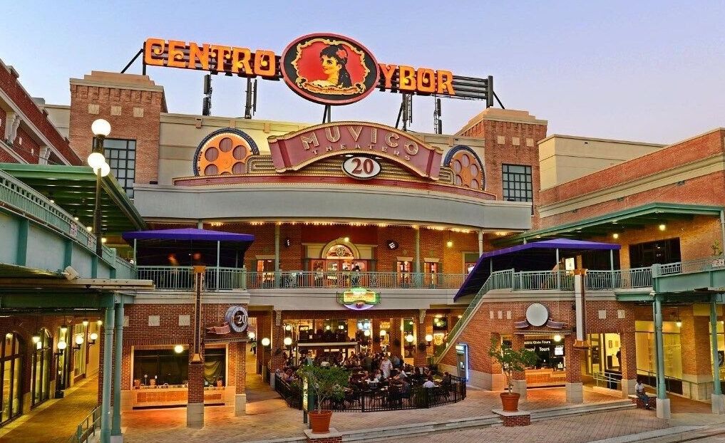 A theater with a marquee reading "Centro Ybor" and "Nuvico Theaters" with 20 screens.