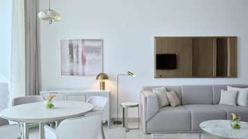 Suite, 1 Bedroom, Balcony | Living area | 50-inch Smart TV with satellite channels, Netflix, streaming services