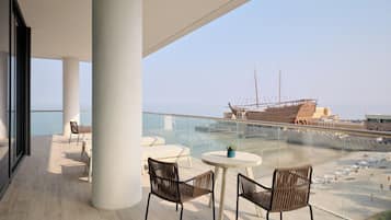 Suite, 1 King Bed, Terrace (Arabella, Seafront) | Minibar, in-room safe, laptop workspace, blackout drapes