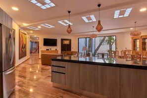 Family Villa | Living area | 165-inch flat-screen TV with cable channels, Netflix, streaming services - Revel in the views pool Villa Chapulines (Oaxaca)