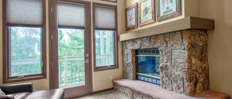 Premium Townhome | Living area | Fireplace