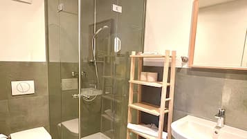Hair dryer, towels, soap, toilet paper