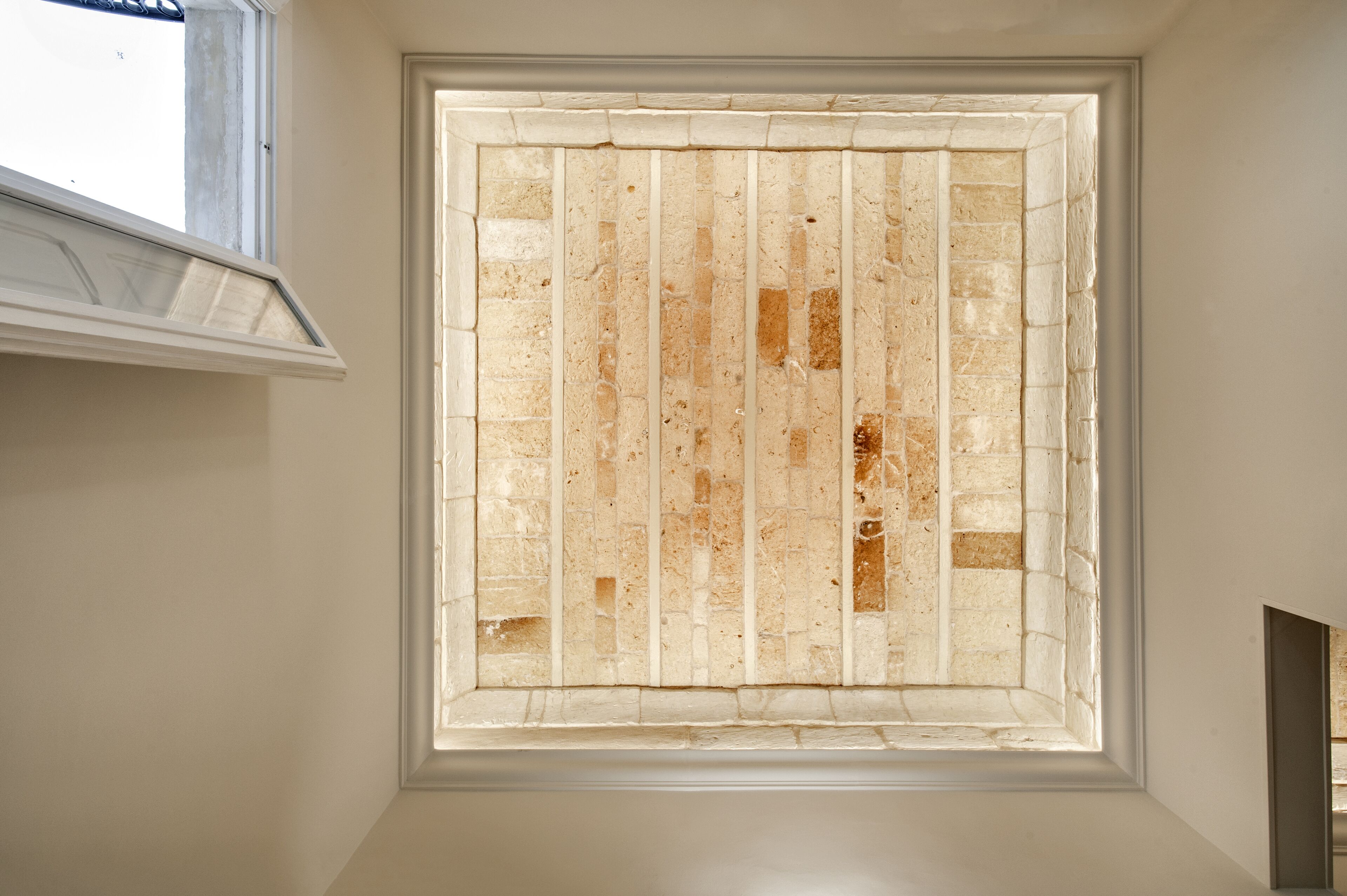 A skylight with a brick pattern design.