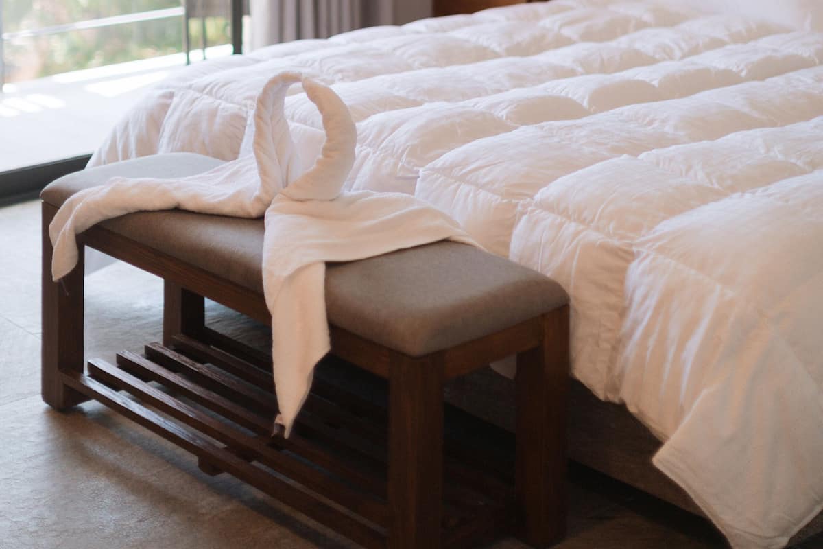 Junior Suite | 1 bedroom, in-room safe, desk, iron/ironing board