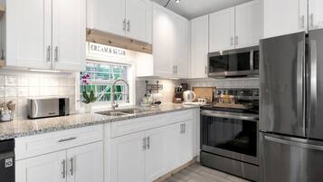 Luxury Villa | Private kitchen | Full-sized fridge, microwave, oven, stovetop