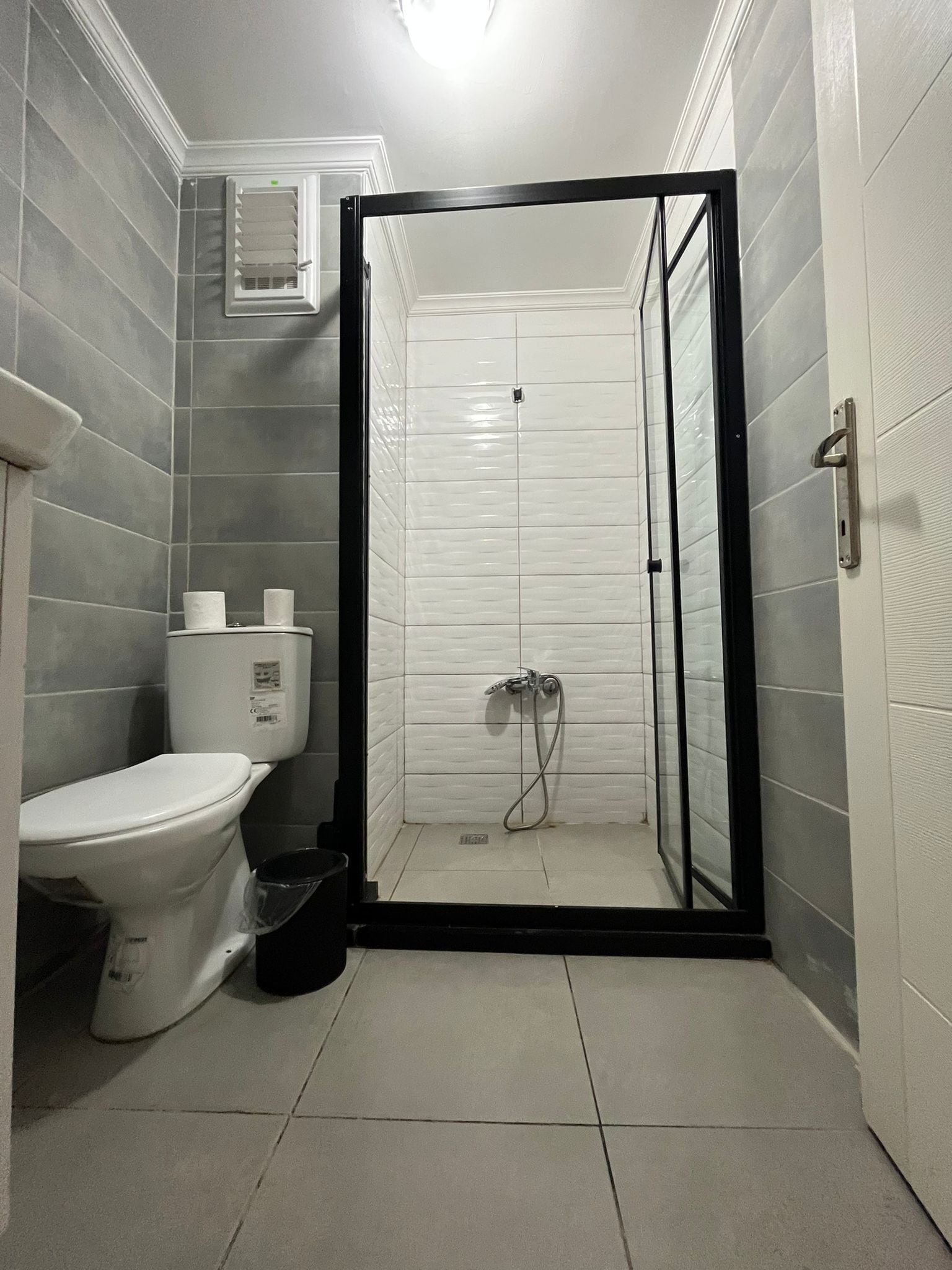 Shower, free toiletries, hair dryer, slippers