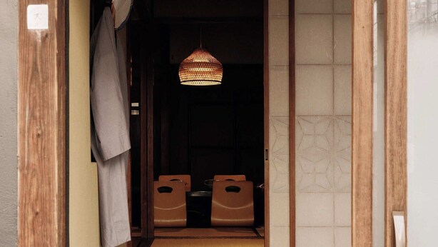 A traditional Japanese room with tatami flooring, a shoji screen, and a hanging lamp. - CraftFlat Asakusa 3 bdr House -Stay Local, Stay Stylish (Sumida City)