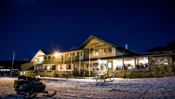 A building with a sign reading "White Spider Restaurant & Bar". - Eiger Chalet (Perisher Valley)