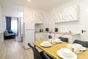 Fridge, microwave, stovetop, electric kettle