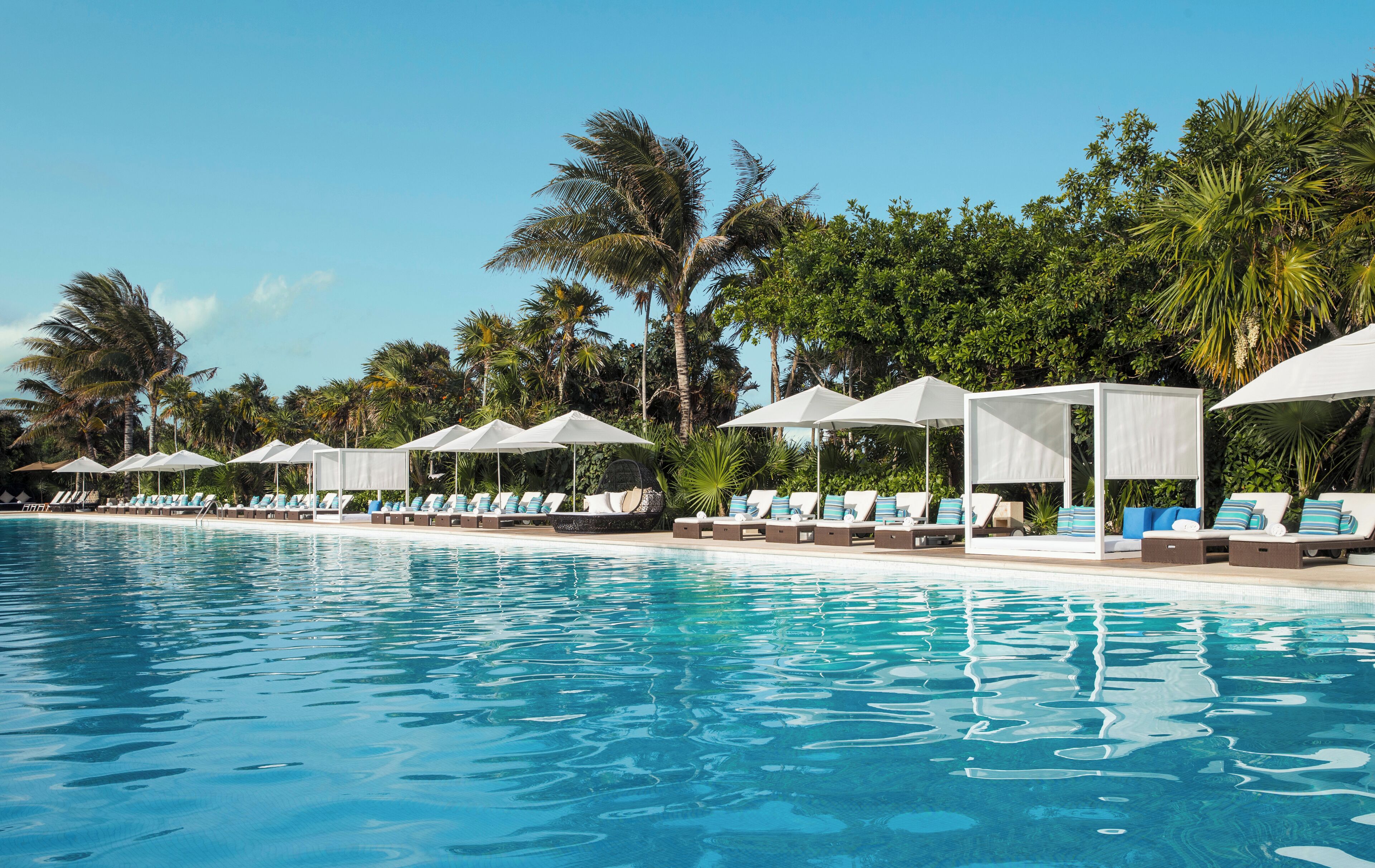 5 outdoor pools, cabanas (surcharge), pool umbrellas