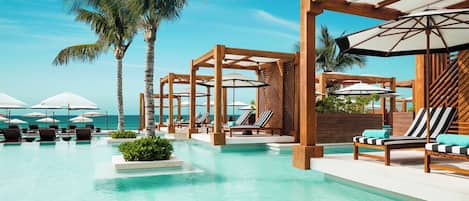 5 outdoor pools, cabanas (surcharge), pool umbrellas