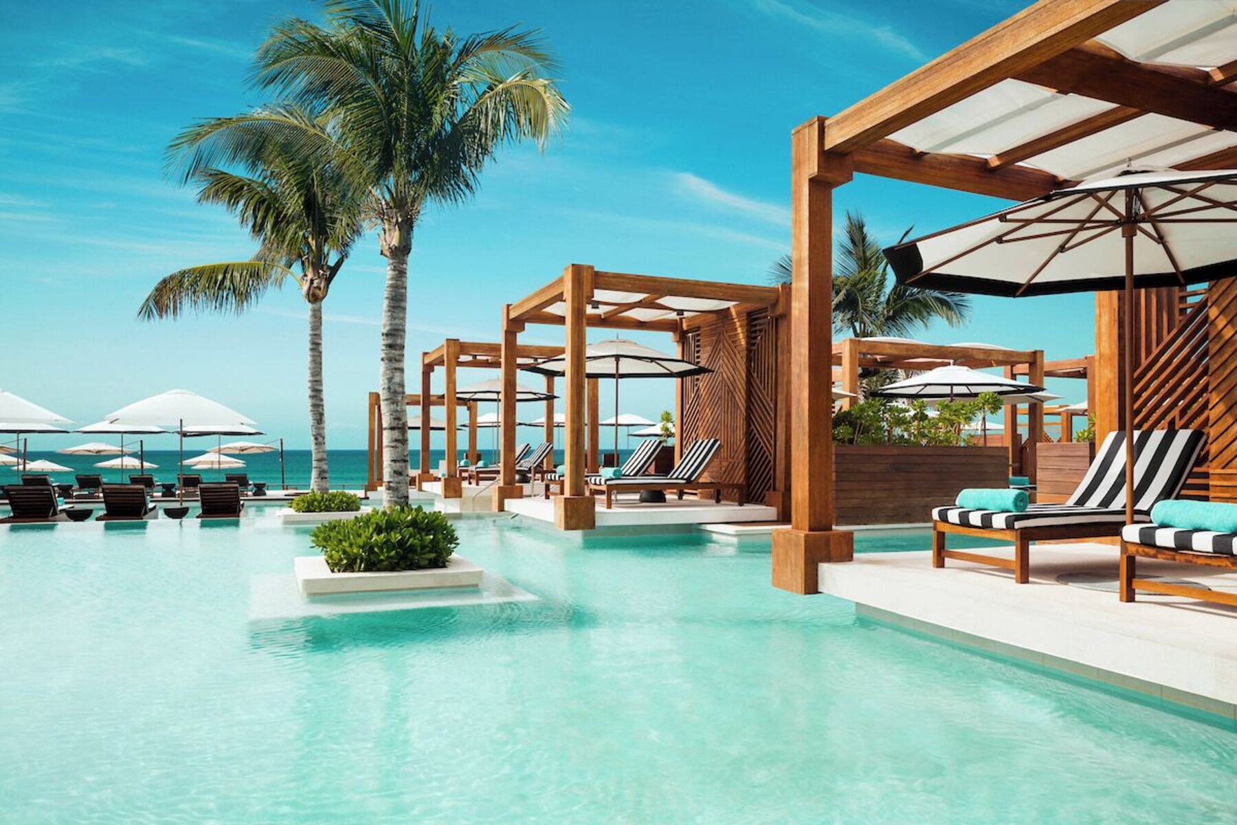 5 outdoor pools, cabanas (surcharge), pool umbrellas