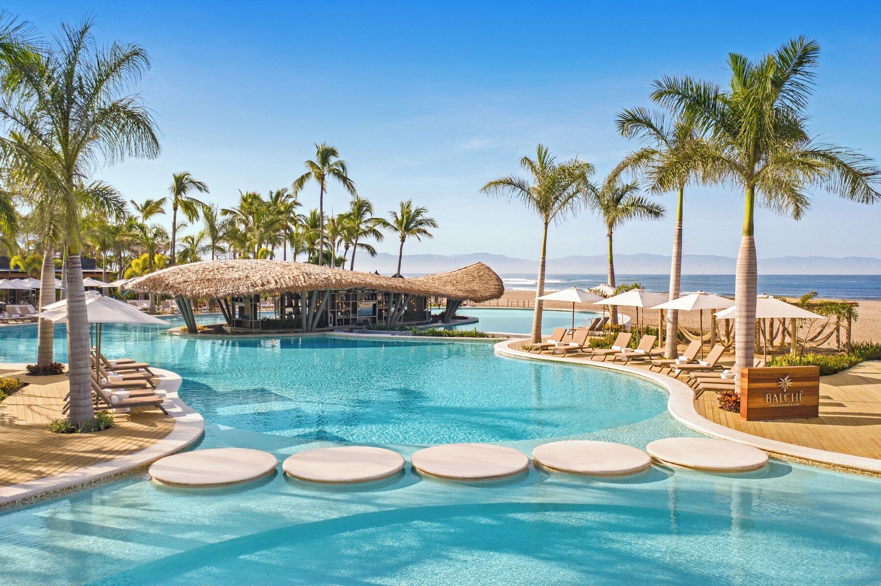 9 outdoor pools, open 9:00 AM to 9:00 PM, free cabanas, pool umbrellas
