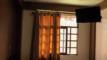 Blackout curtains, free WiFi, bed sheets