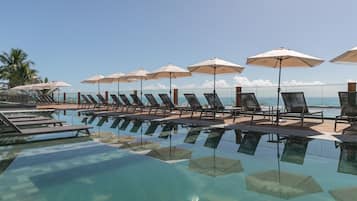 Outdoor pool, pool umbrellas, pool loungers