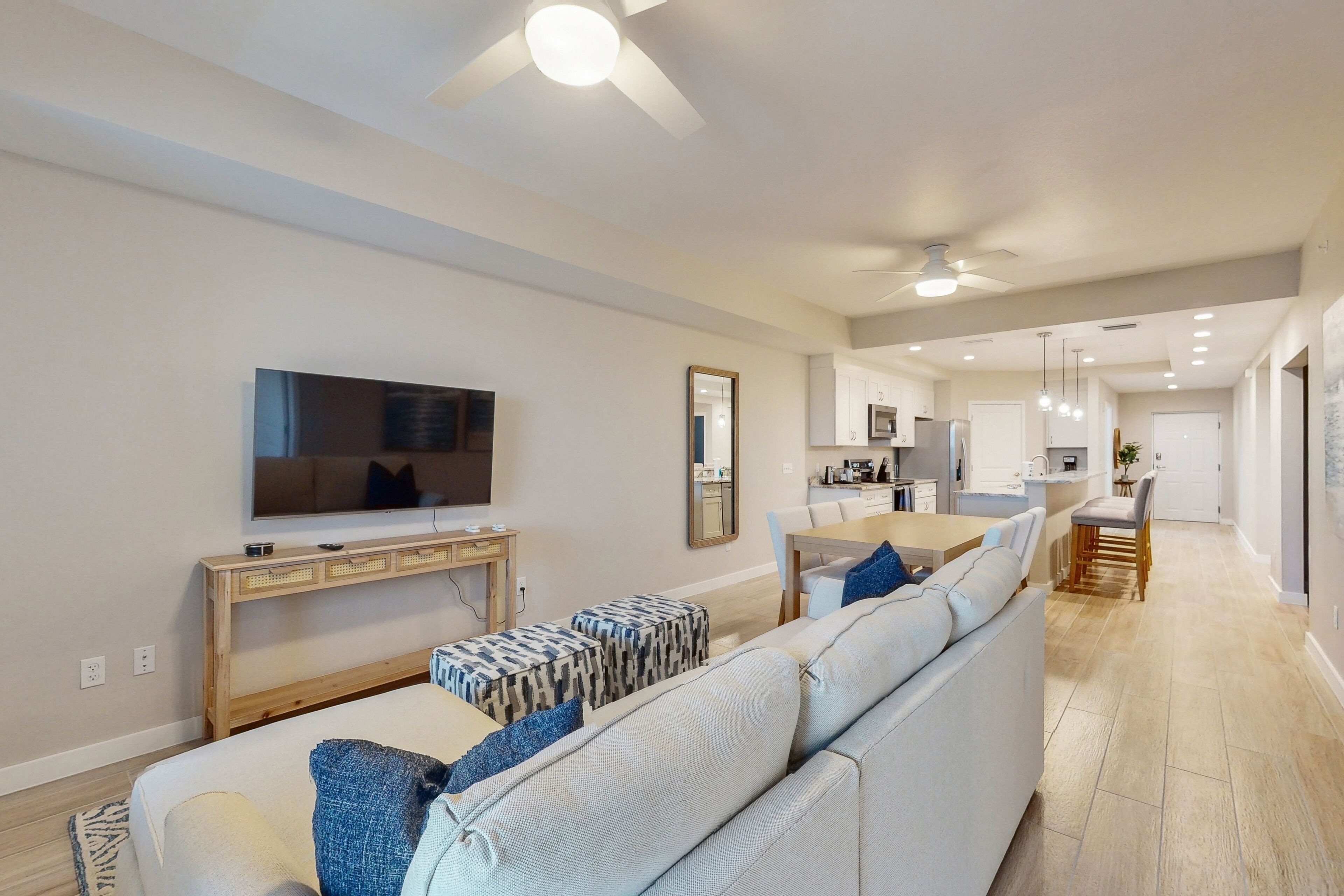 Dog-friendly, canal-front condo with a saltwater pool, boat slip, & washer/dryer