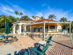 Outdoor dining - Emerald Island Resort 3 bedroom Townhome with Resort  Access (Kissimmee)