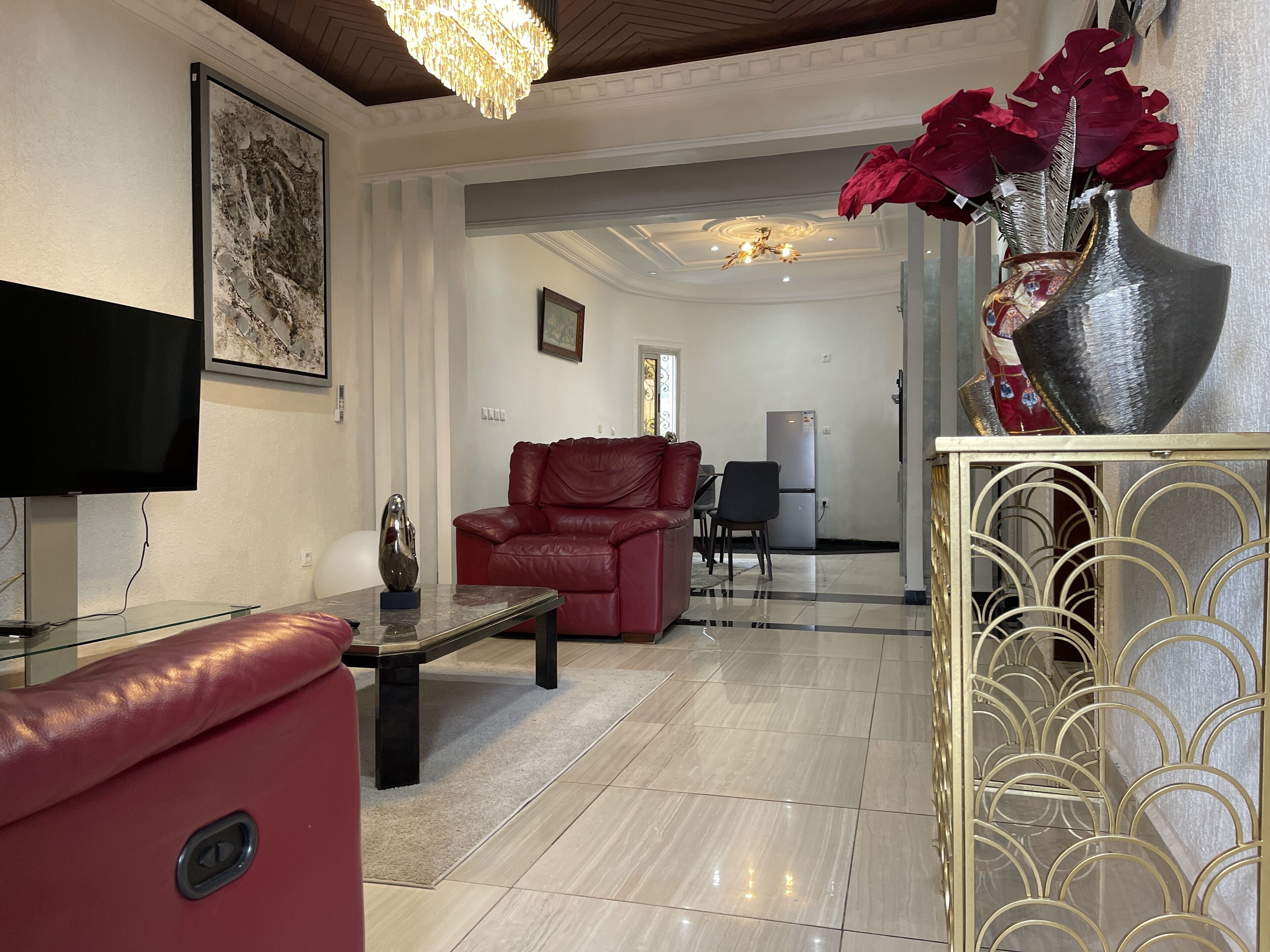 Apartamento Deluxe | Zona de estar | Una televisión