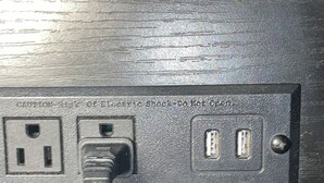 A power strip with two USB ports and a standard electrical outlet. - King Bed. Funny Bone, Fraze, WPAFB, museum Adventure Reef. Fun get away!  (Kettering)