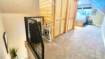 1 bedroom, desk, iron/ironing board, travel crib