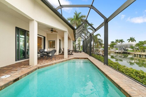 Spacious Waterfront Home - Great Location & Perfect for Families ~Pool, Wi-Fi, Beach Gear & More!