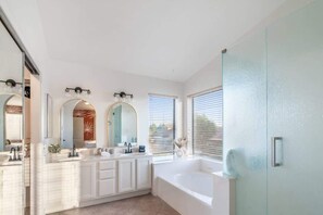 Shower, hair dryer, towels, shampoo