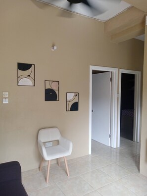 Apartamento, 3 quartos, sacada, vista para o jardim | Sala de estar