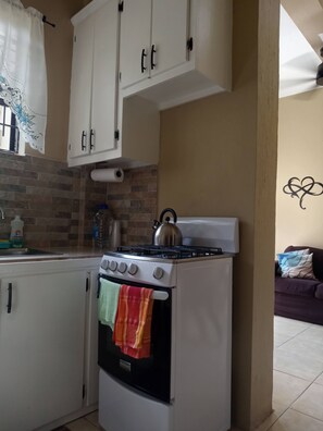 Apartamento, 3 quartos, sacada, vista para o jardim | Parte interna